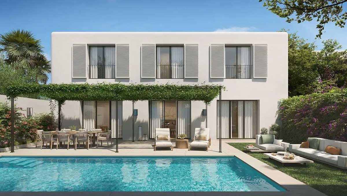 Modern two-story villa with a pool, outdoor seating, and lush landscaping in a sunny, tranquil setting.