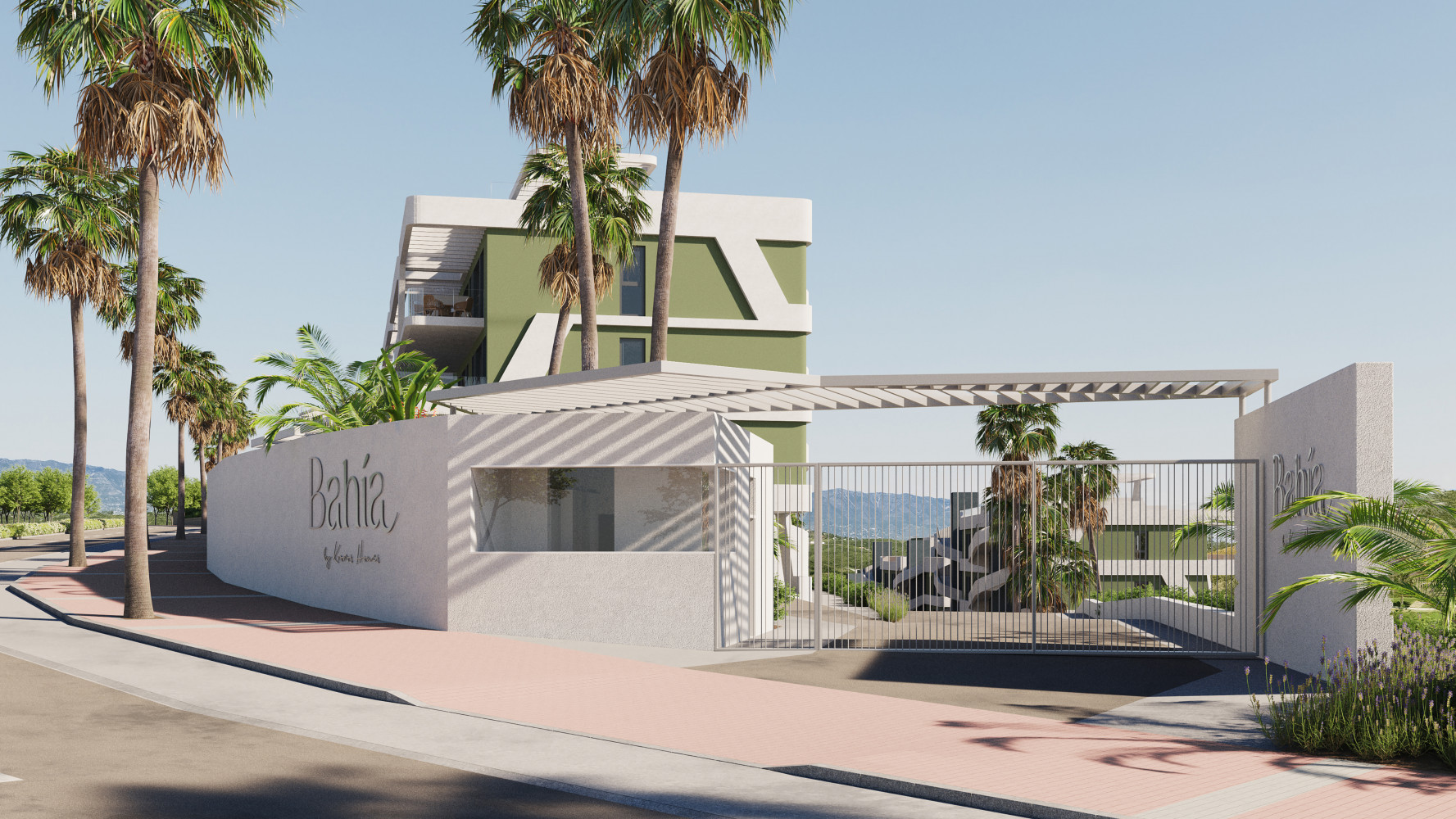Contemporary gated community entrance with palm trees and modern architecture in a sunny coastal location.