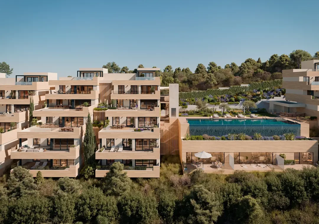 Contemporary multi-unit complex with lush landscaping and a central pool area, surrounded by greenery.