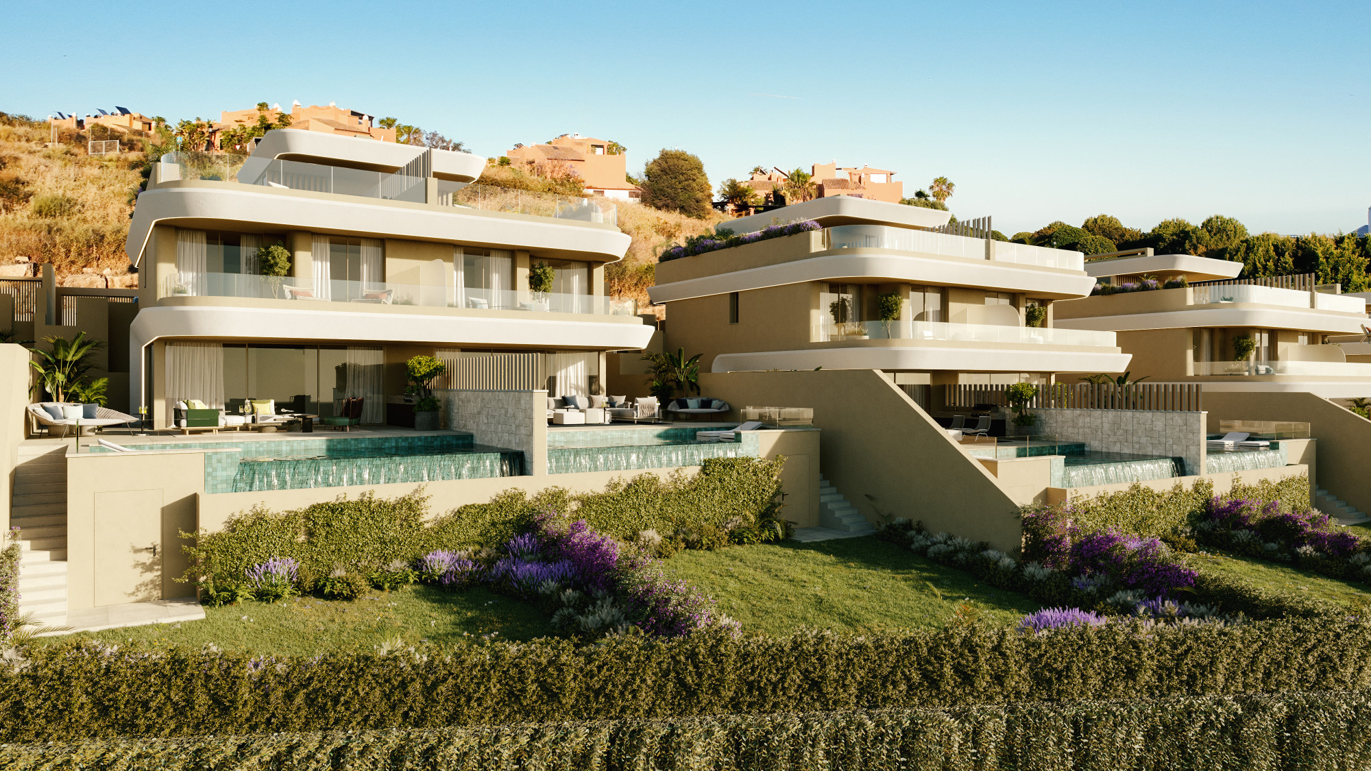 Contemporary hillside villas with terraces and pools, surrounded by lush greenery and vibrant landscaping.