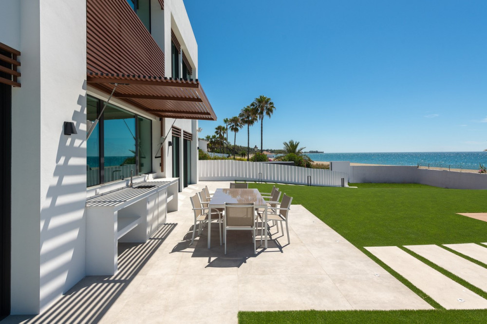 Stunning contemporary villa located front line beach on the New Golden Mile. Image 3