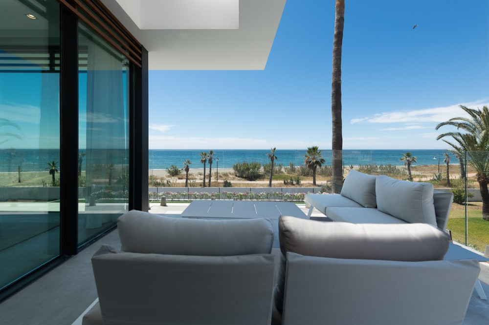 Stunning contemporary villa located front line beach on the New Golden Mile. Image 6