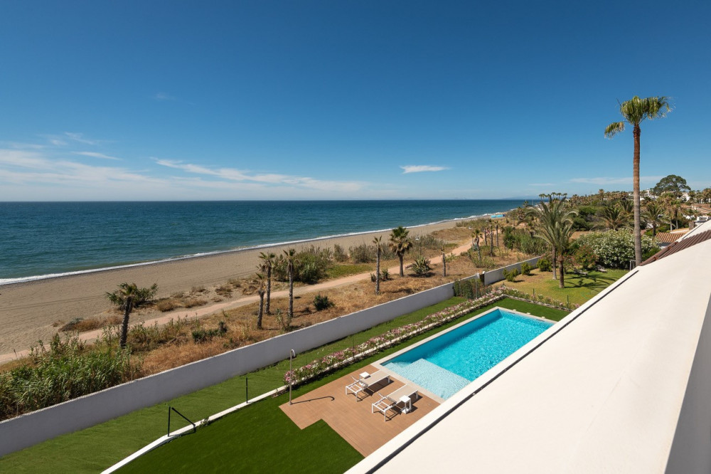 Stunning contemporary villa located front line beach on the New Golden Mile. Image 7