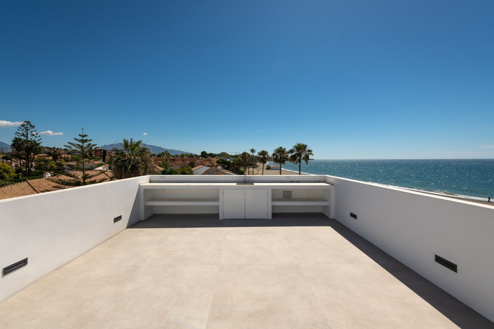 Stunning contemporary villa located front line beach on the New Golden Mile. Image 8