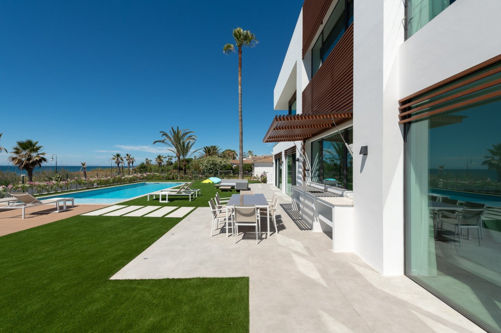 Stunning contemporary villa located front line beach on the New Golden Mile. Image 9