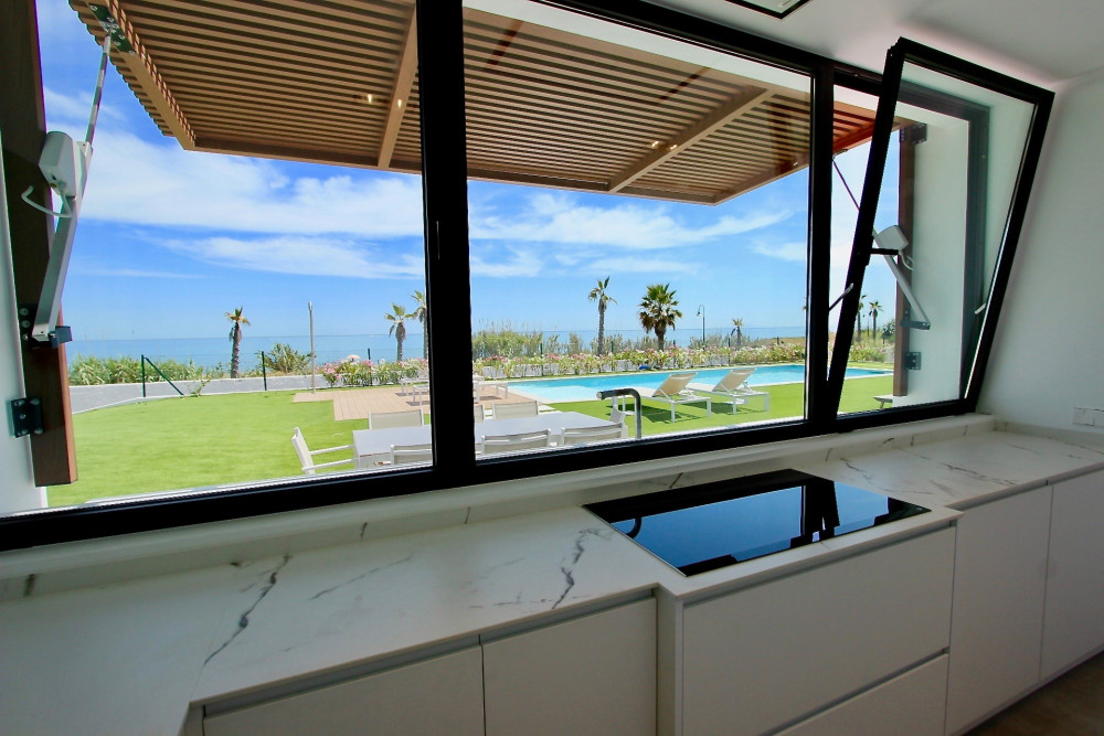 Stunning contemporary villa located front line beach on the New Golden Mile. Image 13