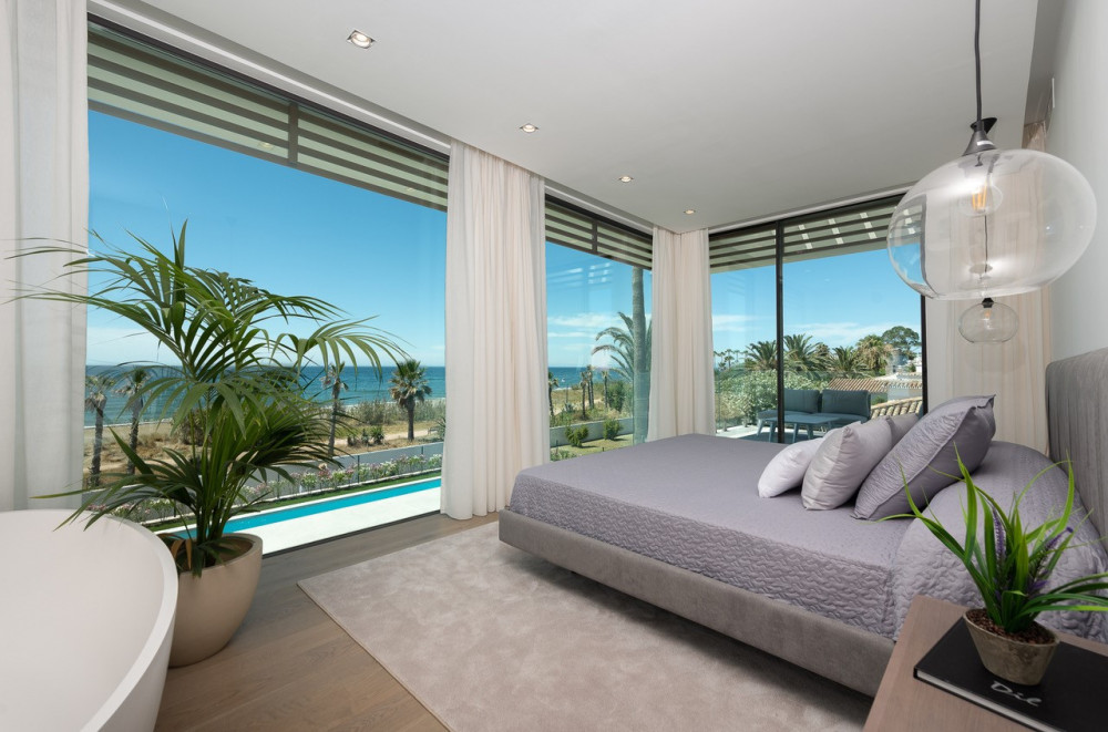 Stunning contemporary villa located front line beach on the New Golden Mile. Image 15