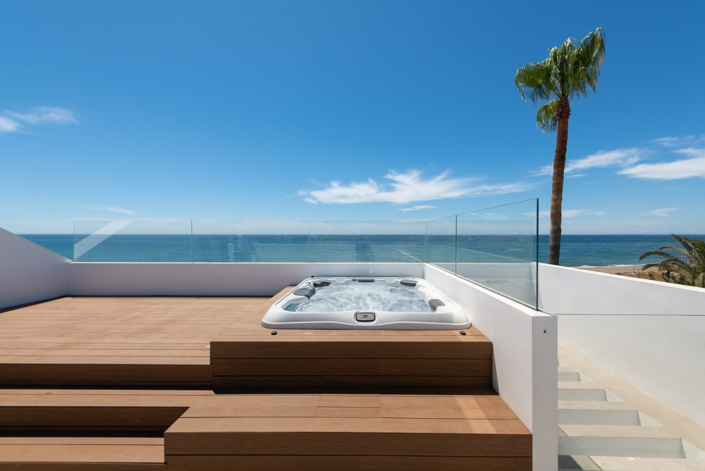 Stunning contemporary villa located front line beach on the New Golden Mile. Image 25