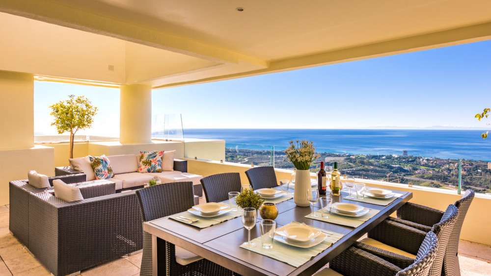 Introducing this stunning duplex penthouse in Los Monteros, with endless pano...