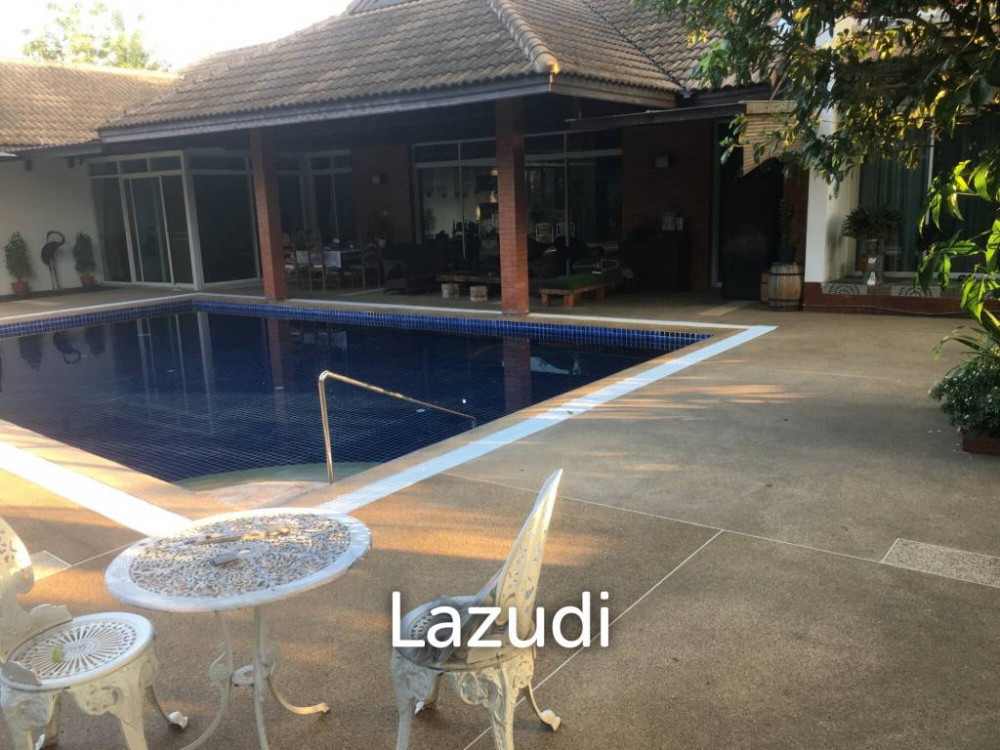Two story detached house set on 1 Rai of land with private pool Image 5